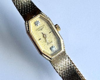 Vintage Longines Quartz Watch - Thin Dial with Minor Crystal Scratches, Working but Needs Servicing