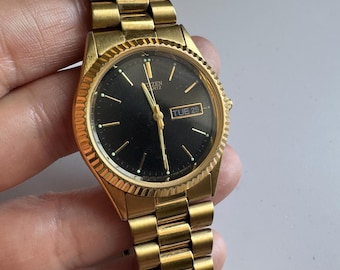 Vintage Citizen Quartz Day-Date Watch with Black Dial - New Battery, Two-Tone Band, Analog Timepiece