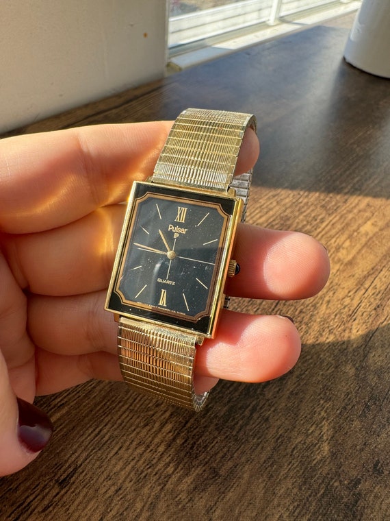 Vintage Gold Tone Pulsar Watch with Black Frame Wa
