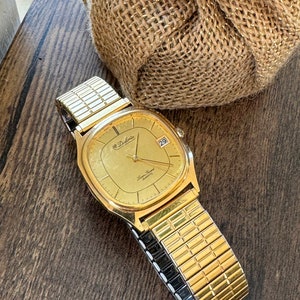 Montre Dufonte Par Lucien Picard - Bracelet Serpentine - Neuf Avec étiquettes - Mouvement Quartz