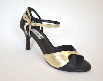 Sapatos de tango femininos, modelo peep toe, em couro dourado e preto.