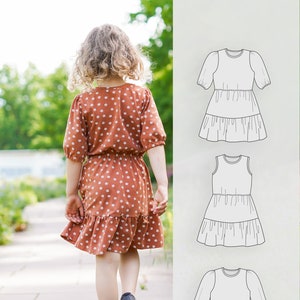 Girl's dress sewing pattern with an elastic waist and a tired skirt, Vintage dress pattern for children, sizing: baby to 10 years