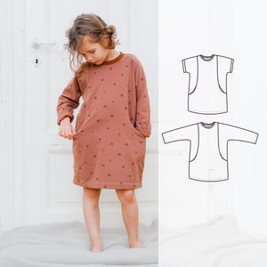 Children's dress sewing pattern with pockets,  The Rainy Day dress is an oversized kids' pattern for girls from baby to 10 years.