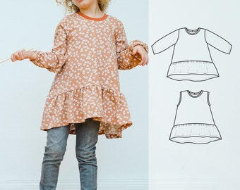 May include: A brown and white floral print dress with a ruffled hem. The dress has long sleeves and a round neckline. A sewing pattern for a similar dress is shown on the right side of the image.