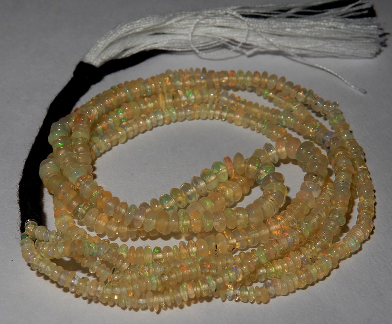 Amazing Fire Natural Ethiopian opal Roundel Beads 2 to 4 MM Size Superb Fire Welo Fire Opal Beads 16 inch long Strand In low Prize