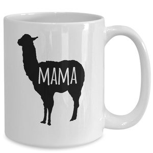 May include: White ceramic coffee mug with a black silhouette of a llama and the word "MAMA" printed on the llama's body.