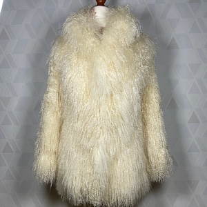 Vintage 70s mongolian tibetan lamb fur boho coat studio 54 hippie coat with long and curly hair_