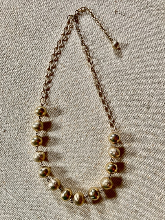 Long Gold Tone Necklace