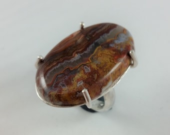 Crazy lace agate of 22 x 34 mm on silver ring size 17.5