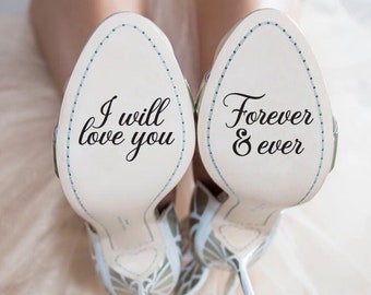 May include: A pair of white high-heeled shoes with a blue butterfly design. The soles of the shoes have the text "I will love you" and "Forever & ever" written on them.