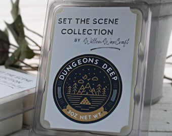 Wax Melt Clamshell, Dungeons Deep, Set the Scene Collection, Dragon's Blood, Labdanum, Cinnamon, Clove, Sassafras, Molten Rock Mine, Red Tea