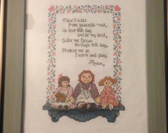 Child's cross-stitched prayer