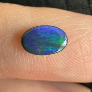 Australian Polished and Cut Freeform Opal Cabochon .42 CT Weight 7.11mm x 4.50mm