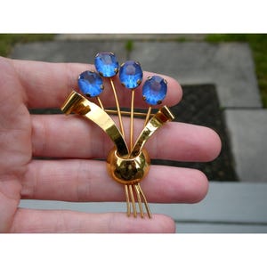 Vintage Gilt Sterling Silver Faceted Blue Rhinestone Floral Bouquet Brooch Pin