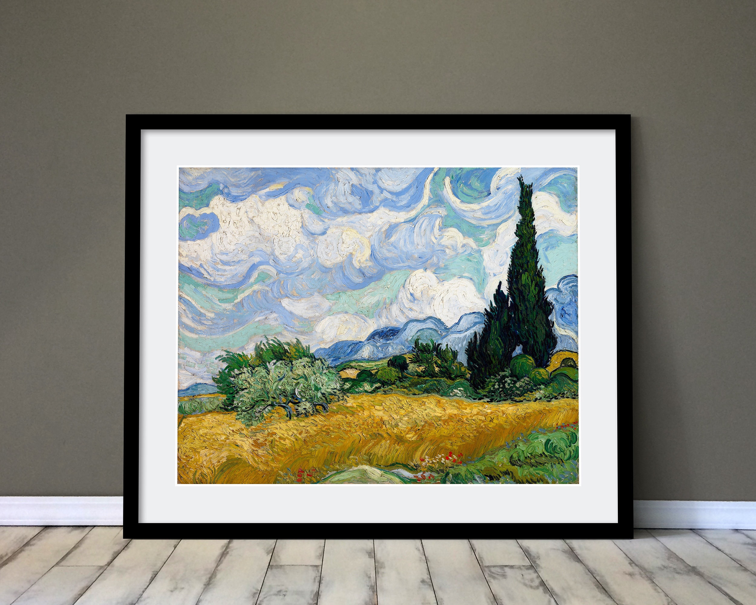 a wheatfield with cypresses