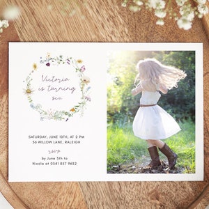 May include: A floral wreath birthday invitation for a girl turning six. The invitation features a watercolor illustration of a wreath of wildflowers and the text "Victoria is turning six". The invitation also includes the date, time, and location of the party, as well as the RSVP information.