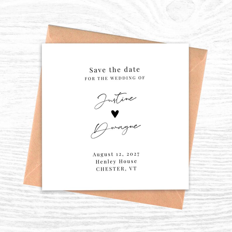 May include: A white save-the-date card with black script and a heart symbol, set inside a brown envelope. The text reads "Save the date for the wedding of Justine & Dwayne, August 12, 2027, Henley House, Chester, VT."