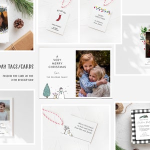 May include: A collection of Christmas cards and gift tags featuring various designs. Some cards feature photos of children, while others have illustrations of snowmen, reindeer, and Christmas lights. The text on the cards includes "A Very Merry Christmas", "Merry Christmas", and "Happy Holidays".