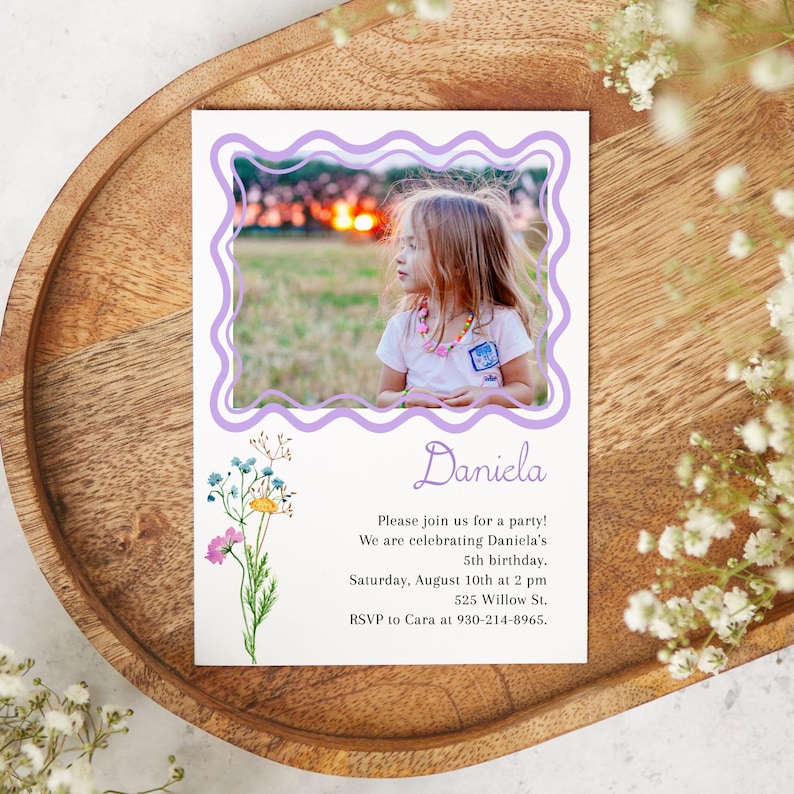 May include: Purple and white birthday invitation with a photo of a young girl in a pink shirt. The invitation says "Daniela" and includes the date, time, and location of the party. RSVP information is also included.