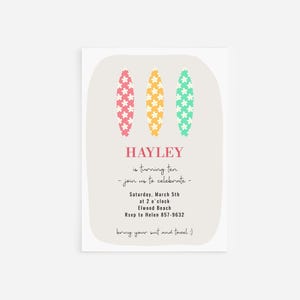 May include: A party invitation with three surfboard illustrations in pink, yellow, and green, each decorated with white flowers. The text reads "HAYLEY is turning ten - join us to celebrate - Saturday, March 5th at 2 o'clock Elwood Beach".