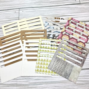 Tim Holtz stitched slot pocket dies, junk journal pockets, scrapbook pockets, ephemera, journal pockets, craft, cream, white, set of 10