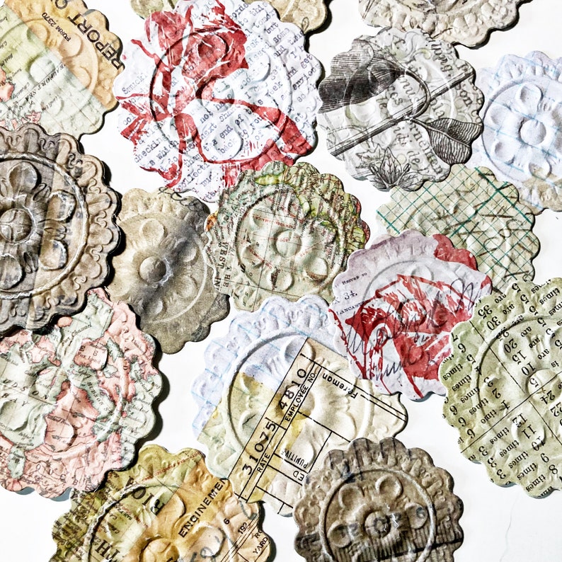 May include: Assortment of vintage paper ephemera with various designs and textures. The paper circles feature maps, text, and floral patterns. Some of the circles have a distressed or aged look.