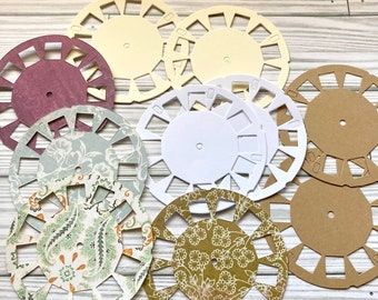 View Master/Picture Wheel die cuts in kraft, white,  cream and patterned card stock, junk journals, scrapbooks, paper crafts.
