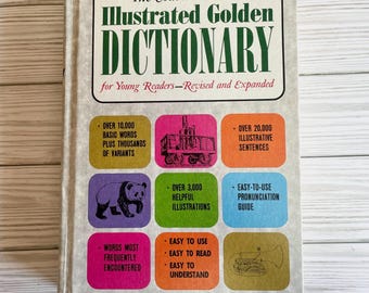 May include: A vintage hardcover book titled "The Courtis-Watters Illustrated Golden Dictionary" for young readers. The cover features colorful boxes with text and illustrations, including a panda, train, and trumpet. The book is revised and expanded.