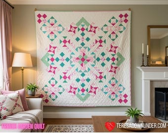 May include: A square quilt featuring a geometric pattern with a white background and repeating motifs in shades of hot pink, teal, and light green. The design includes star-like shapes and diamond accents, all finished with detailed quilting stitches.