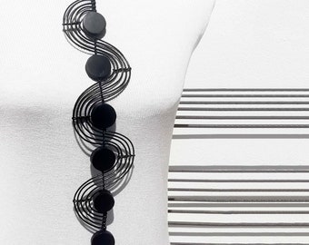 Long contemporary “wave” pendant necklace in leather and ebony