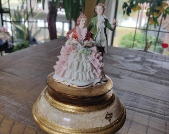 Revolving Dresden Lace Figurines on Ornate Gold Decorative base- Reuge Music Box that plays Mozart's Menuet