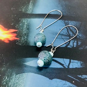 Pendientes azules de brillo