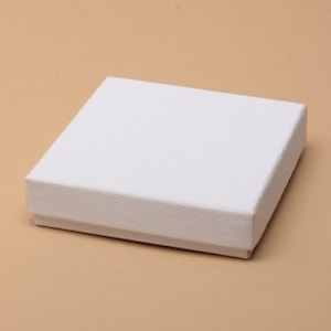 THIN GIFT BOXES, thin for cheap postage, foam backed white flocked inserts. White bracelet boxes. 9x9x2.2cm Post Free for U K orders