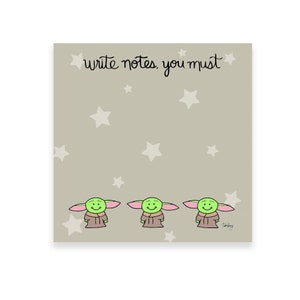 May include: A set of three green and pink cartoon notepad characters with the text "write notes, you must" on a beige background with white stars.