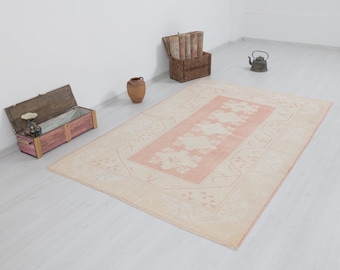 Vintage Pink Oushak Rug: 5x8 Turkish Wool Anatolian Rug