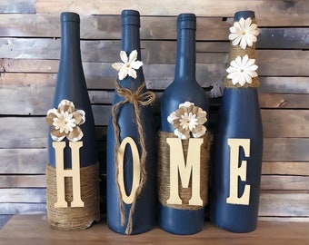 Hand painted decorated home wine bottles in navy blue