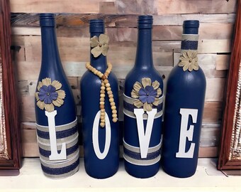 Decorated wine bottles   Navy in color