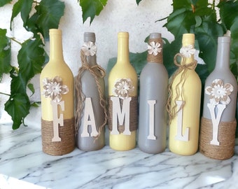 Family yellow and light grey wine bottle decor