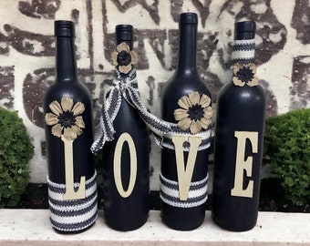 Decorated wine bottles   Black in color