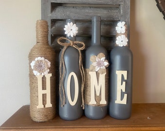 Wine bottle decor.   Hand painted custom decorated Home wine bottles- grey in color