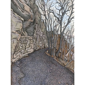 May include: A black and white pen and ink drawing of a rocky path leading into a forest. The path is lined with bare trees and the sky is a light blue.