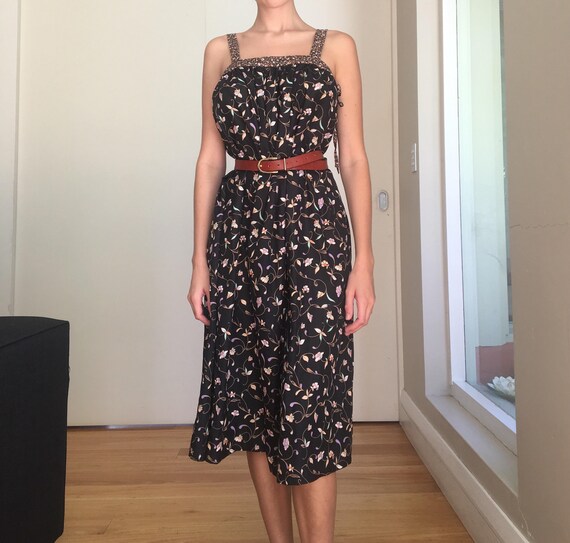 black floral pleated midi dress