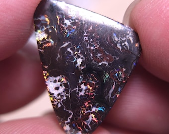 オーパールになります ブラックマトリックス ボルダーオパール カボション 26 x 18 mm A3029