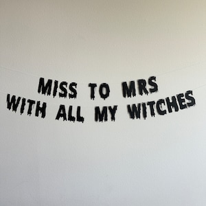 May include: Black and white banner with the text "Miss to Mrs with all my witches".