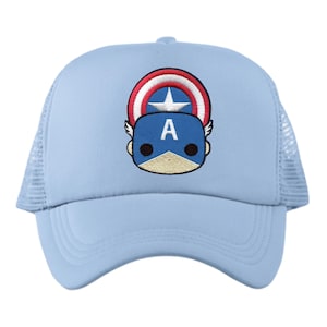 May include: Light blue trucker hat featuring a Captain America design. The design includes a blue face with the letter "A", a white star, and a red, white, and blue shield. The hat has a mesh back.