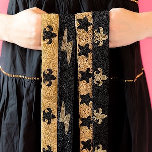 Correa de cuentas de semillas para bolso, correa de bolso transparente, correa dorada con flor de lis negra, correa de Saints