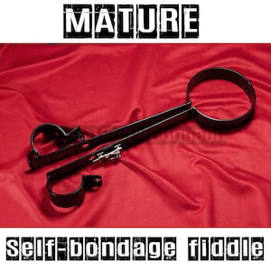 Self-bondage fiddle, pillory, cangue, steel restraint for neck and wrists. Metal bondage, medieval handcuffs, iron manacles, dungeon irons