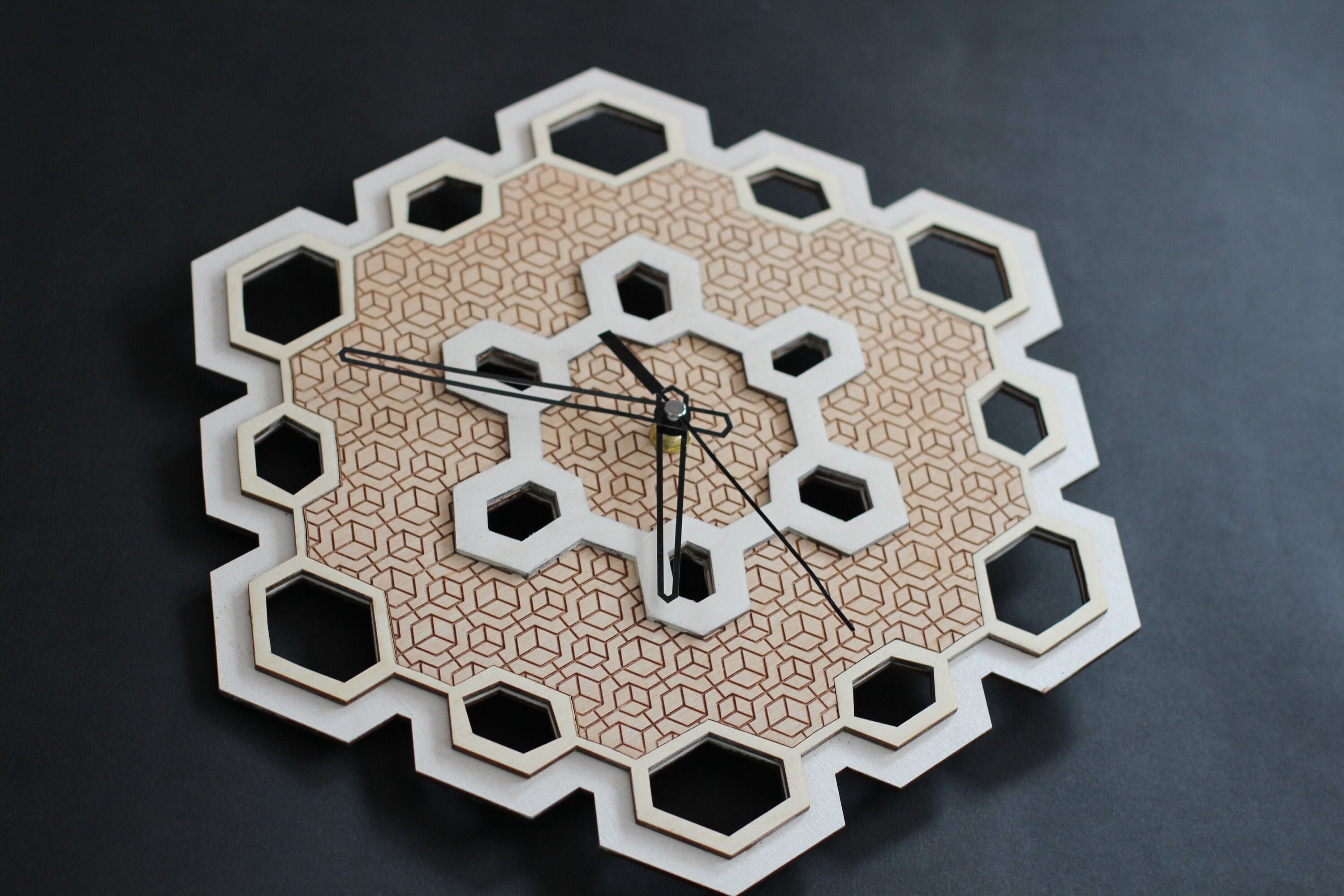 Wooden wall clock with engraved hexagons coming in a Etsy