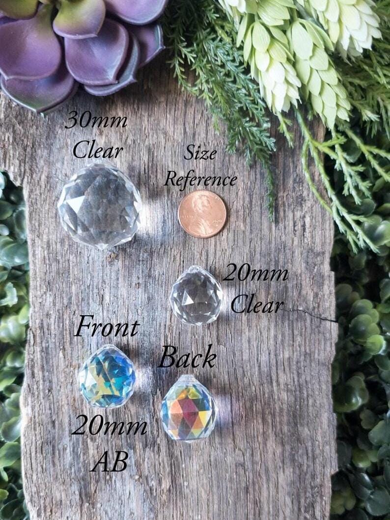 May include: Clear and iridescent crystal prisms in 20mm and 30mm sizes. The image shows the front and back of the prisms, with the text "Front", "Back", "20mm AB", "20mm Clear", "30mm Clear", and "Size Reference".