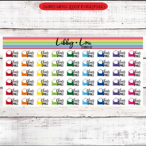 May include: A sheet of colorful stickers featuring a white envelope with the text "Clear Emails" in black. The stickers are arranged in rows and columns on a white wooden background.